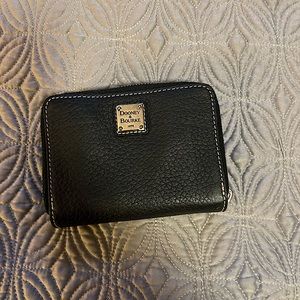 Dooney. Small, cute, black. Missing zipper pull. Shipping Included In Price!